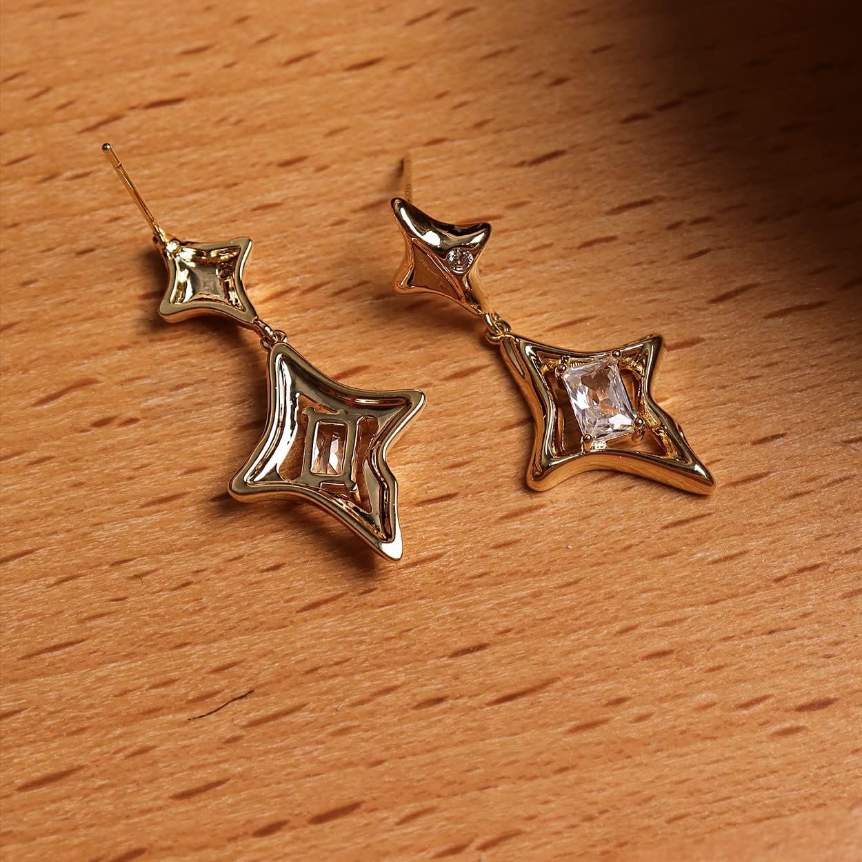 Earring Showdown: Geometric Studs, Star Drops, and Gothic Swords